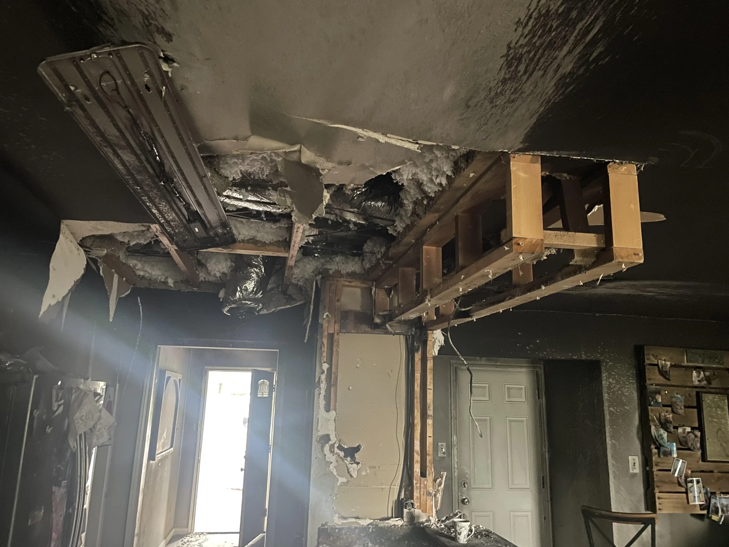 Burned interior ceiling and rafters before Mr. Restore's fire damage restoration in Frisco, TX
